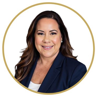 Professional woman smiling in business attire with a gold circular frame.