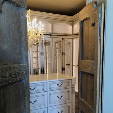 Her Master Closet, antique doors, antique mirrors and crystal chandelier.