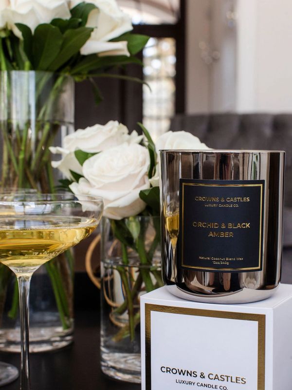 Crowns and Castles Orchid and Black Amber luxury fragrance candle.