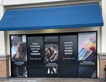 Storefront advertising hearing technology and recovery services.