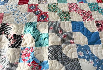 Vintage bow tie quilt finished.