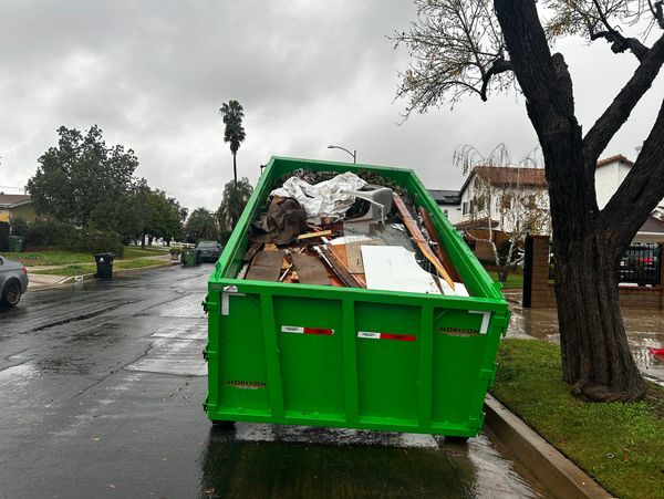Bin rental delivery in progress