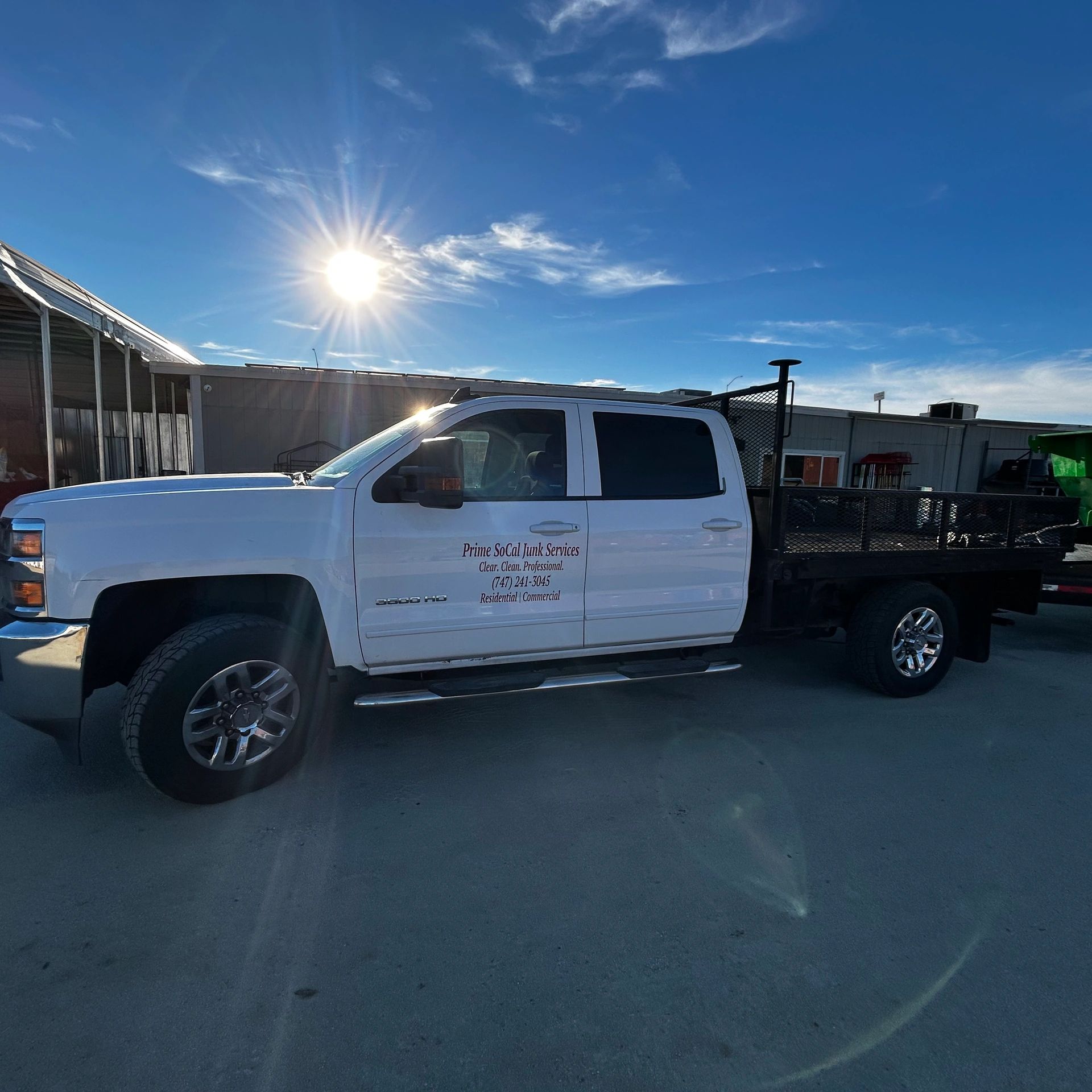 Prime Socal Junk Services truck & junk removal at a commercial site simi valley.