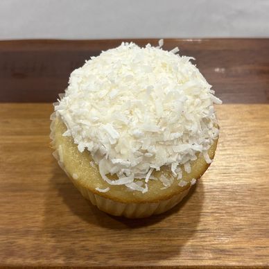 Coconut vanilla flavored cupcake, topped with coconut vanilla flavored buttercream 