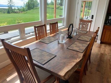 Black Walnut with clear epoxy in the cracks and Rubio Monocoat "Pure" finish.  Built by Eagle River 