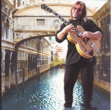 From the "Of Near & Distant Lands" photo shoot.  That's the Bridge of Sighs behind me and I indeed w