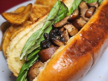 Try our Voyager Dog topped with basil and sauteed mushrooms.