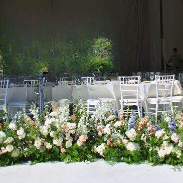 A lush and colorful, pastel wedding meadow for the ceremony 
