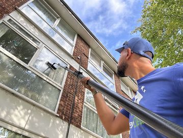 Window cleaning upper storey flat in Perivale. Professional window cleaning with EverClean London.