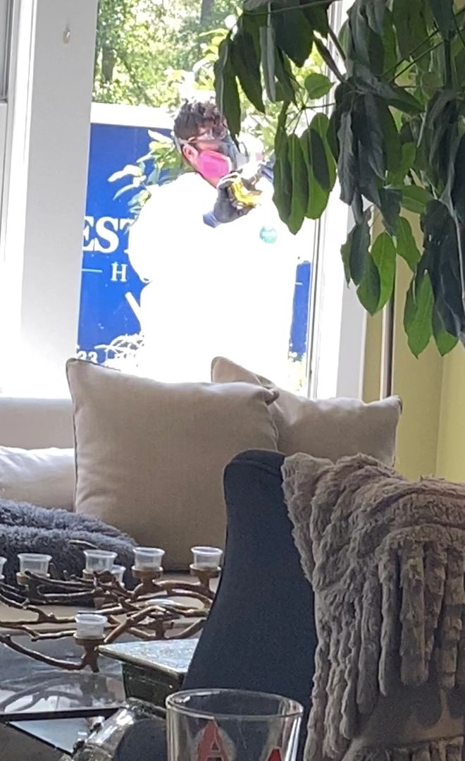 Wearing PPE, While Destroying My Home