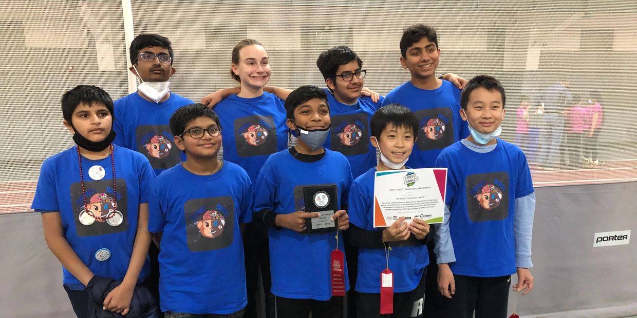 The Monkey Brains after winning the Innovation Project Award at the MICDS FLL Qualifier