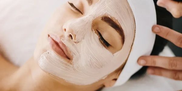 A woman receiving a relaxing facial in Everett, WA at Autumn Noel Esthetics. Get your glow!