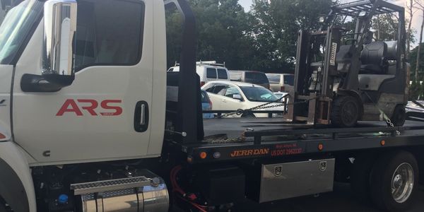 forklift towing, Equipment towing, towing near me, towing service.