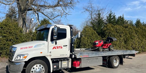 Equipment hauling, ARS Towing