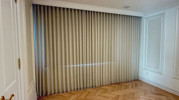 Ripple fold sheers in the bedroom. Blackout shade