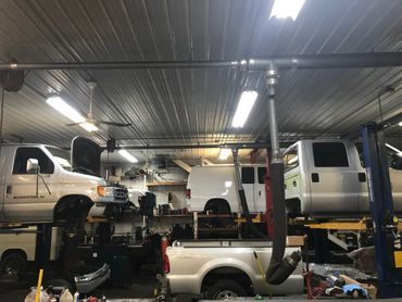 Fleet vehicles on vehicle lifts - North County Service Center - Manchester, Maryland