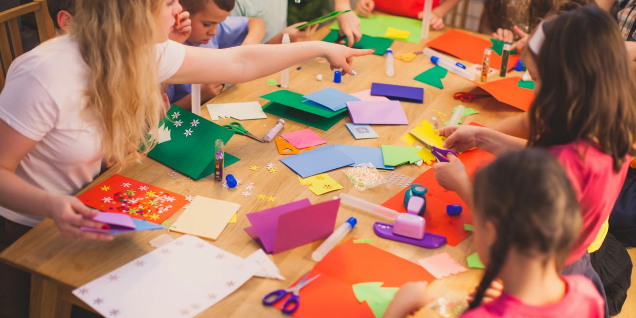 Kids doing colorful crafts at UMAI Foundation — creativity, joy, and healing through play.