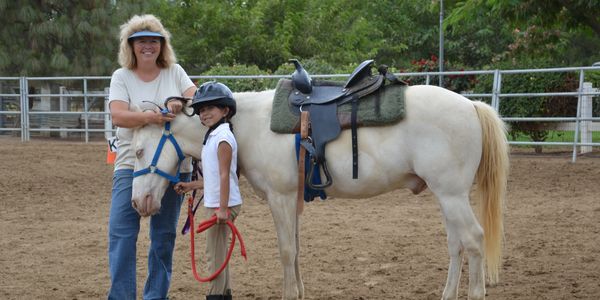 Instructor, horse & student