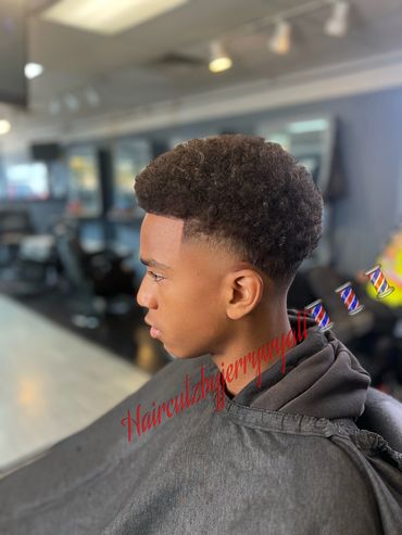 Basic” taper” hair cut.