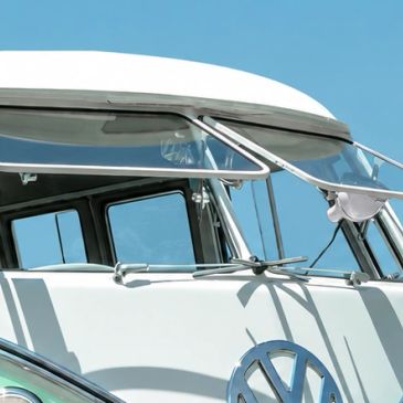 Close-up of a classic Volkswagen bus window.
