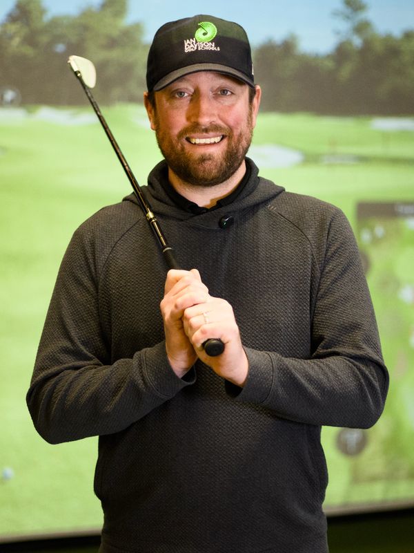 Ian Davison holding a golf club