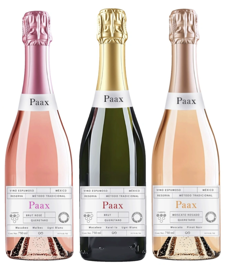 Three bottles of PAAX Mexican sparkling wines in Brut, Rosado, and Moscato varieties.