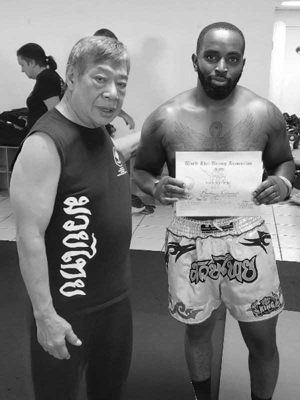 Khun Khru Anthoney Edward 
Black / white Pa Prajiad 
Instructor under Ajarn Adams & GM Ajarn Chai. P