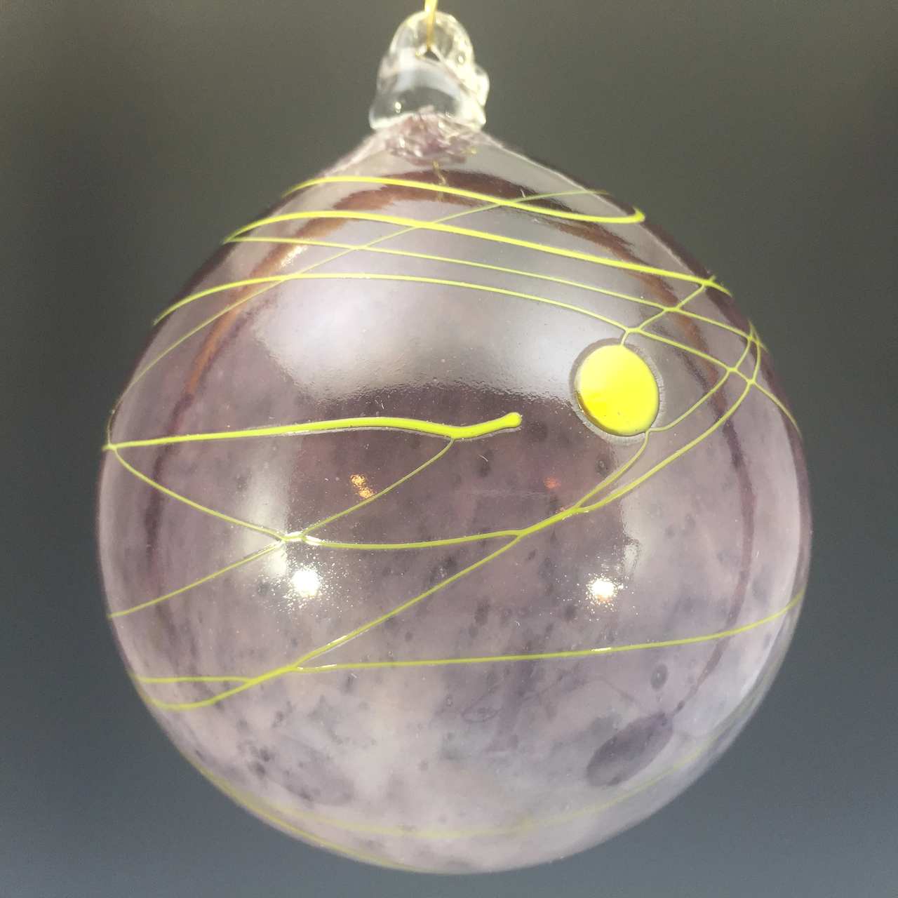 Ball ornament purple with yellow thread