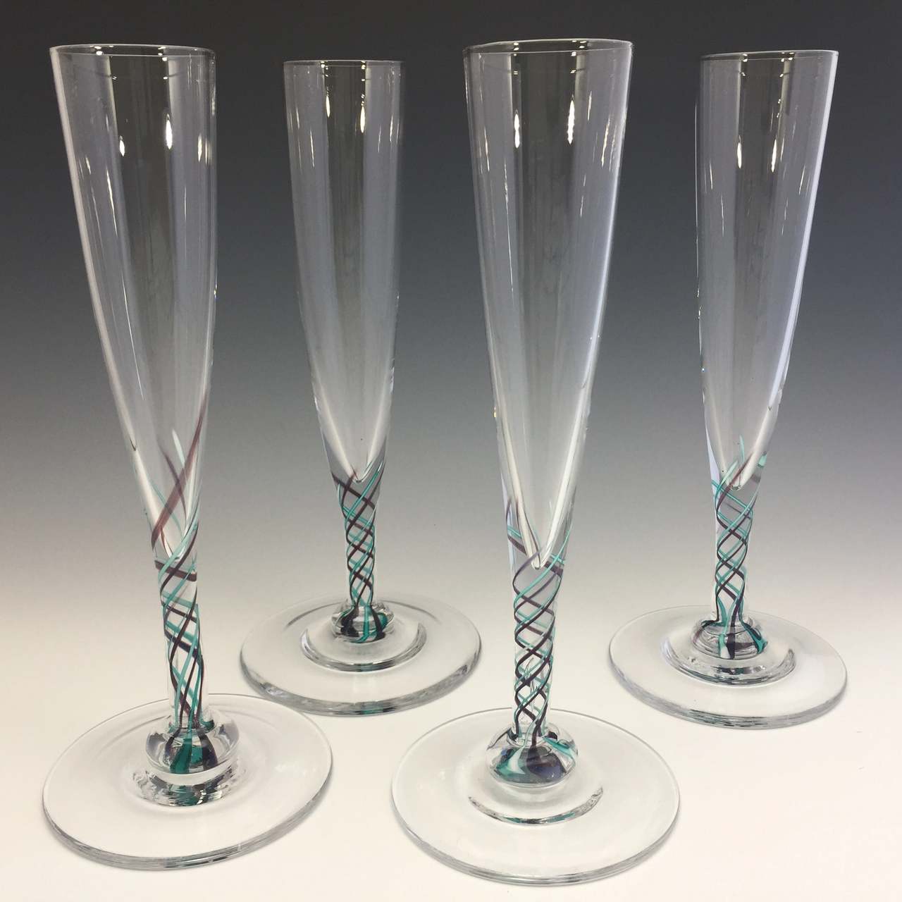 Purple latticino champagne flutes hand blown by Alex Kalish