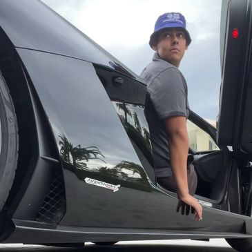 Myself in a Lamborghini Aventador which is ceramic coated performing a maintenance wash