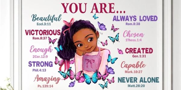 Encouraging words surround a thoughtful girl and colorful butterflies.