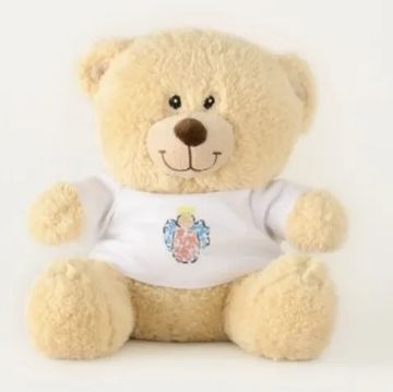 Sherman Teddy Bear wearing a white t-shirt with a pastel blue, yellow, pink angel design by artist L