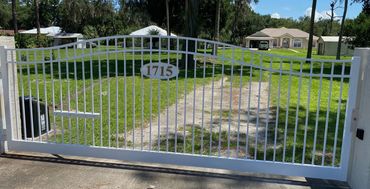 custom driveway gate near astor park,
daves fence, AAA fence, AAA fence daytona, ponce, samsula 