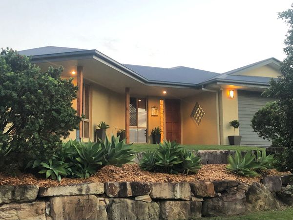 Pico Pups Daycare exterior view showing a residential private family home.