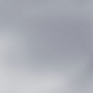 A smooth, gray gradient surface with subtle texture.