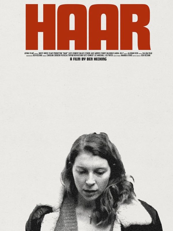 Film poster for 'Haar' featuring a woman looking down.