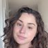 beautiful woman applying MyTalow beef tallow balm to face wrinkles and smile lines