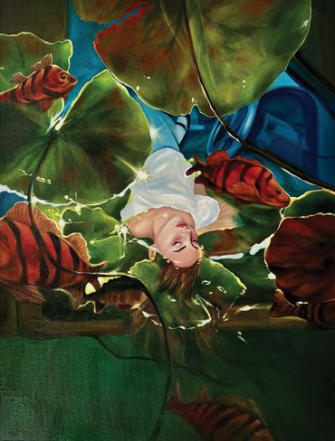 Surreal image of a person underwater surrounded by large fish and lily pads.