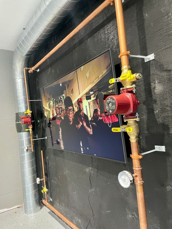 Hydronic heating system, boiler room, heated floors, snowmelt Toronto HVAC GTA York Region