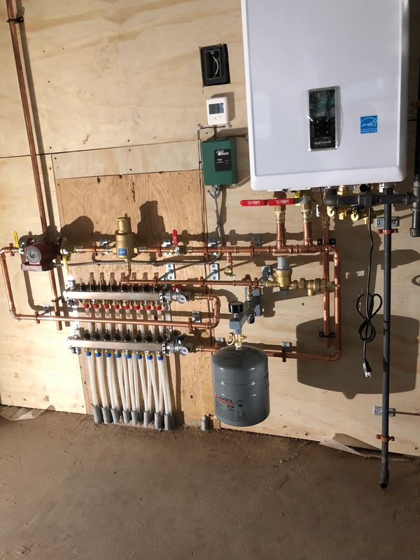 Hydronic heating system, boiler room, heated floors, snowmelt Toronto HVAC GTA York Region