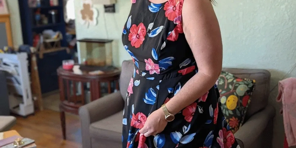 Virginia Hicks in a floral dress in her art studio.