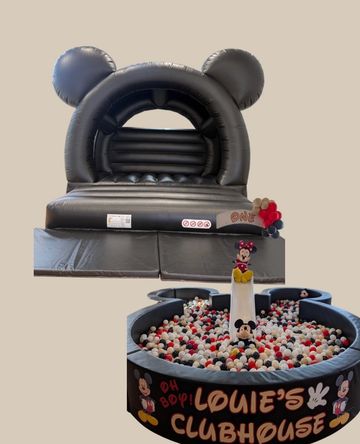 Mickey Mouse-themed inflatable bounce house and ball pit for kids.
