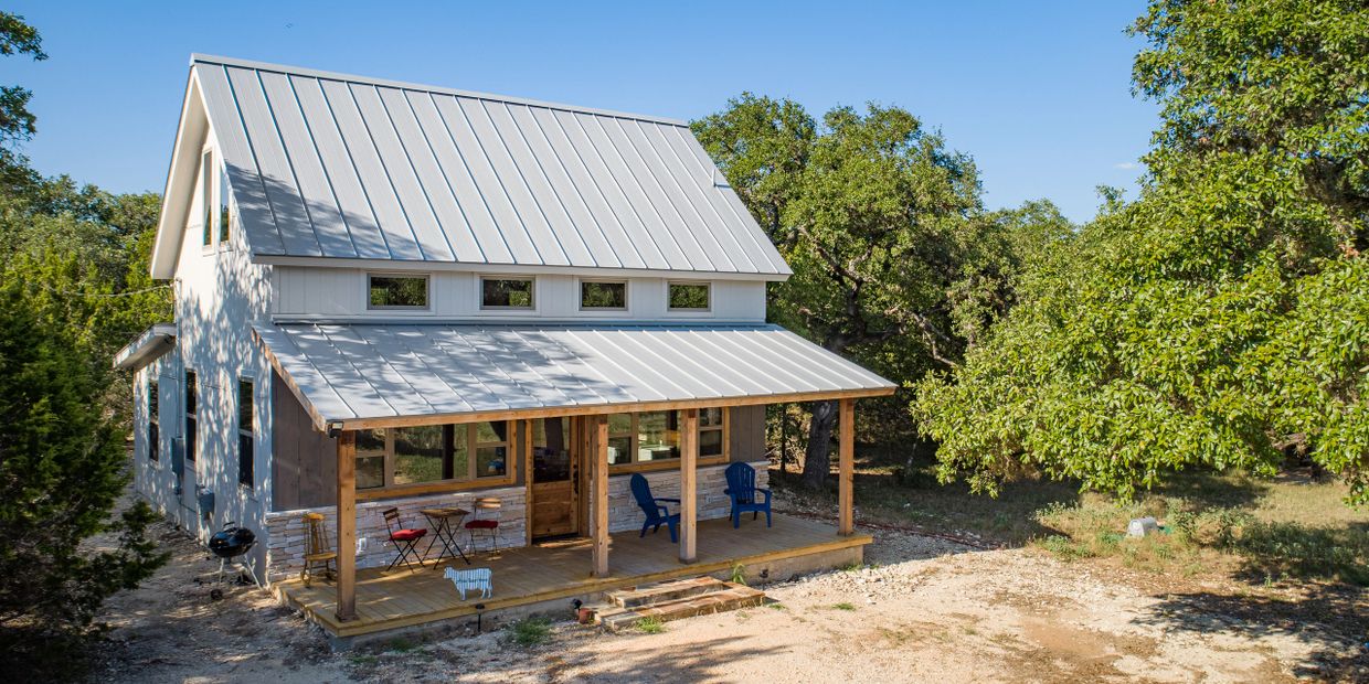 Custom farmhouse style home designed and built by Texas Hill Country Custom Homes builder.