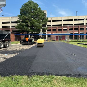 Asphalt paving parking lot and sport courts 