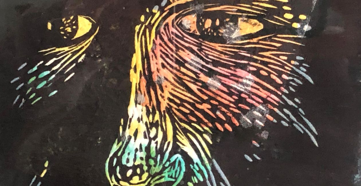 Original linocut of face.