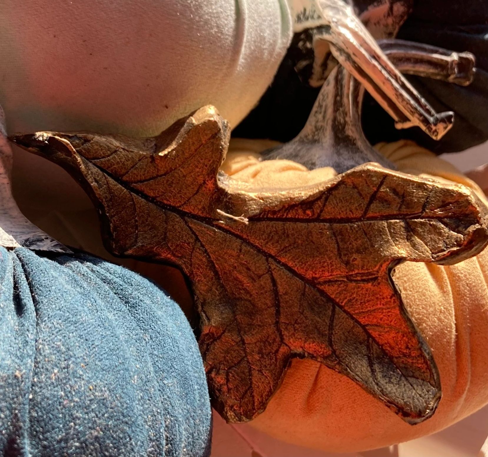 Ceramic leaf sculpture.