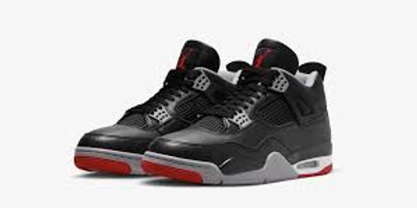 Pair of black and red Air Jordan sneakers.