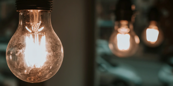 A row of shining lightbulbs on a string 