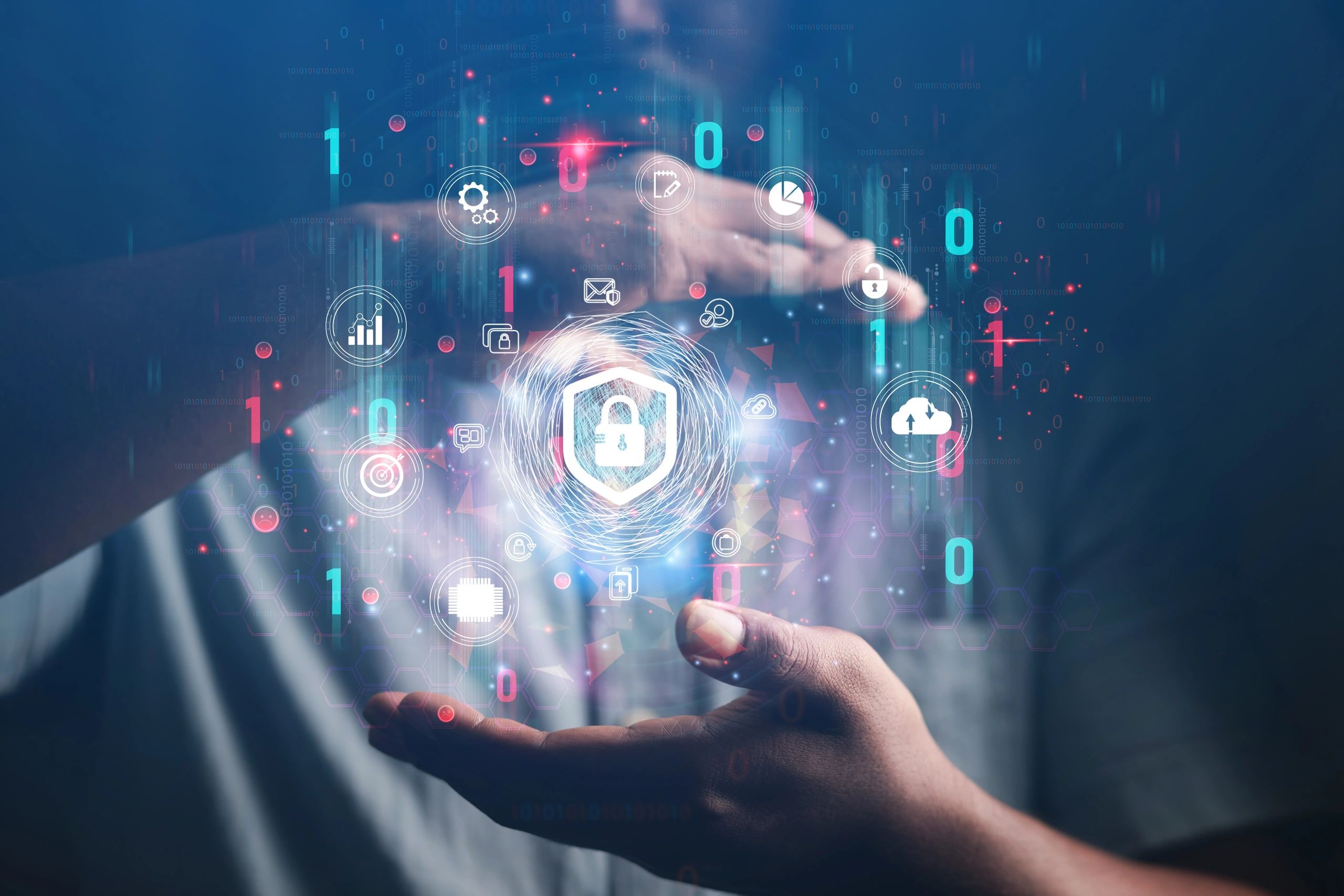 Hands protecting digital security icons.