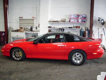 Red car in in a workshop